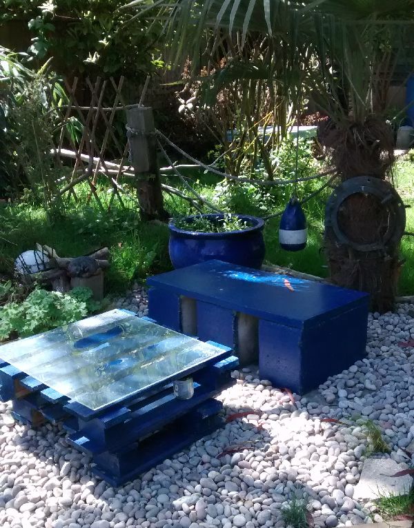 Using recycled materials and planting for wildlife Pond and surroundings